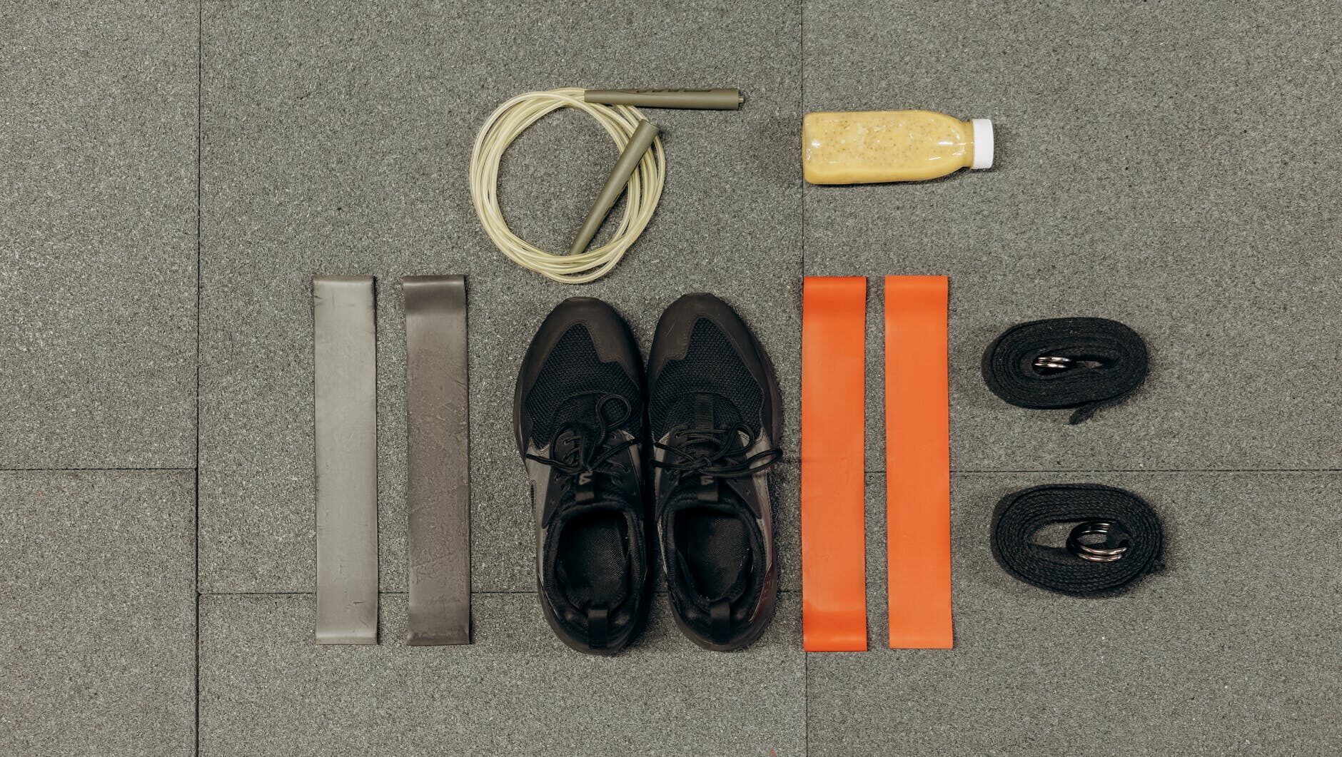 black training shoes and exercise tools
